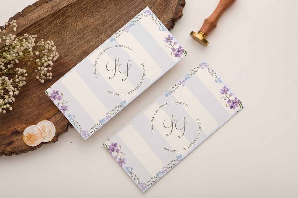 Monogrammed striped envelopes with wax seals