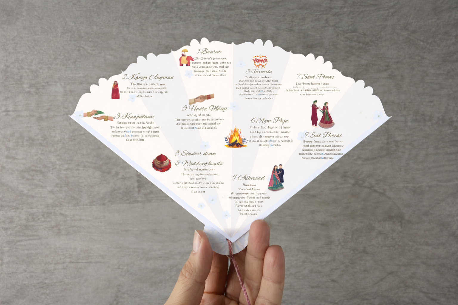Hand fan printed with the wedding ceremony itinerary